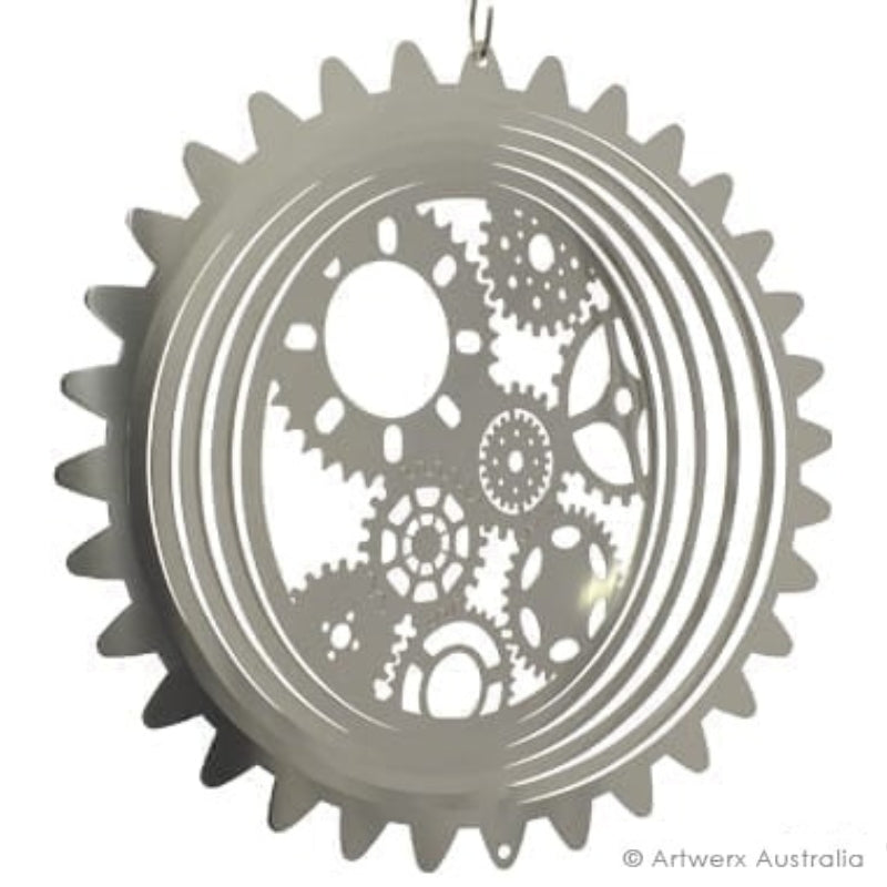 wind spinner flat lay showing design of cogs on a white background