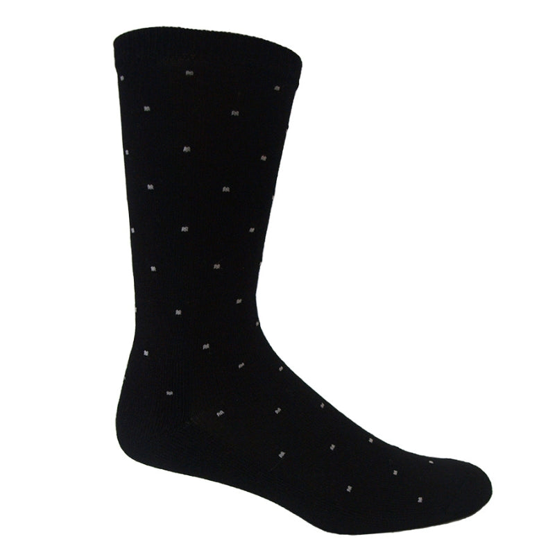 Black and white dot bamboo comfort business sock cutout on white background