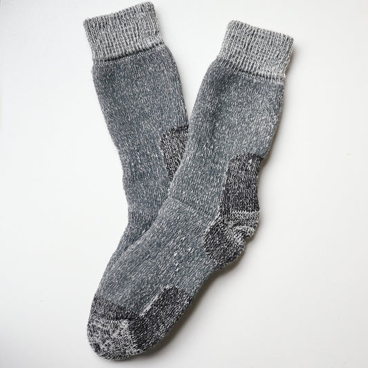 Charcoal merino wool work boot socks laying flat on white background