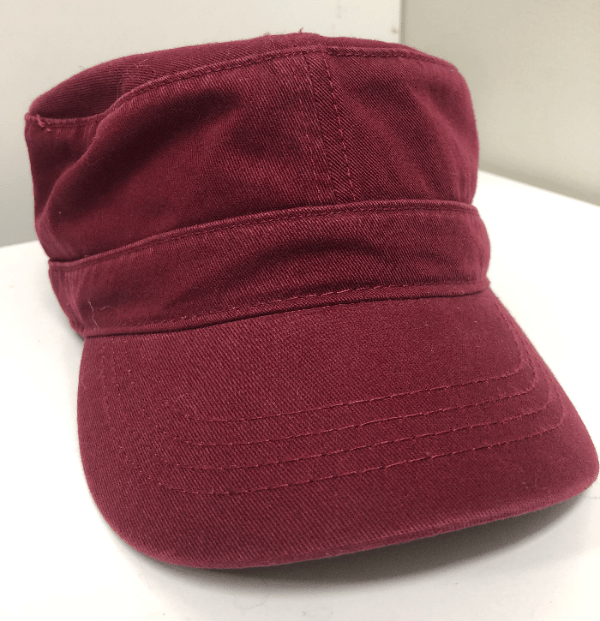 Red cotton cap with velcro adjustment on white background