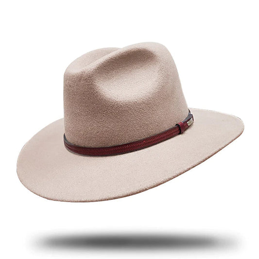 Wool felt fedora hat with brown leather band on white background